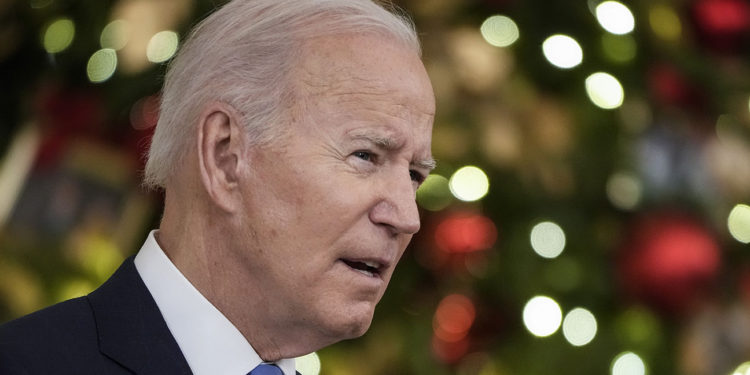 WASHINGTON, DC - DECEMBER 21: U.S. President Joe Biden speaks about the omicron variant of the coronavirus in the State Dining Room of the White House, December 21, 2021 in Washington, DC. As the omicron variant fuels a new wave of COVID-19 infections, Biden announced plans that will expand testing sites across the country, distribute millions of free at-home tests and boost federal resources to hospitals in need. (Photo by Drew Angerer/Getty Images)