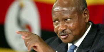 President of Uganda Yoweri K Museveni gestures as he speaks during a news conference in a hotel in St Julians, Valletta, Malta on the first day of the Commonwealth Heads of Government Meeting (CHOGM), Friday Nov. 25, 2005.  CHOGM was opened by Britain's Queen Elizabeth II on Friday and the event is due to hosted by Uganda in two years time.  (AP Photo/Martin Cleaver)