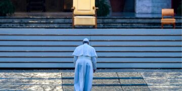 Pope Francis walks towards the platform to preside over a moment of prayer on the sagrato of St Peters Basilica, the platform at the top of the steps immediately in front of the façade of the Church, to be concluded with the Pope giving the Urbi et orbi Blessing, on March 27, 2020 at the Vatican. (Photo by Vincenzo PINTO / AFP) (Photo by VINCENZO PINTO/AFP via Getty Images)