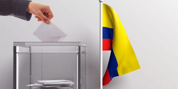 Glass ballot box and a small Colombia flag. 3d illustration