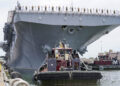 NORFOLK, Va. (Aug. 14, 2025) - Sailors and Marines man the rails aboard the Wasp-class amphibious assault ship USS Iwo Jima (LHD 7) as it departs Naval Station Norfolk for a regularly scheduled deployment. Sailors and Marines of the Iwo Jima Amphibious Ready Group (IWO ARG) - 22nd Marine Expeditionary Unit (MEU) Special Operations Capable (SOC) departed Norfolk and Camp Lejeune, North Carolina after completing a comprehensive, nine-month training program. (U.S. Navy photo by Mass Communication Specialist 1st Class Clay Whaley)