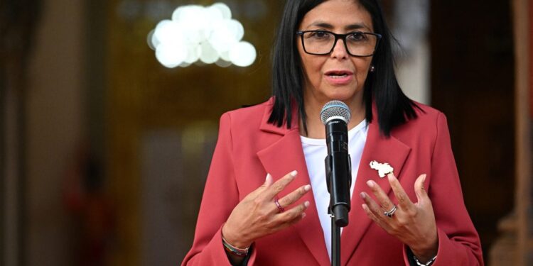 Venezuelas interim president, Delcy Rodriguez speaks alongside US Interior Secretary Doug Burgum (out of frame), after their meeting at the Miraflores Presidential Palace in Caracas on March 4, 2026. US Interior Secretary Doug Burgum on March 4, 2026,  became the latest senior Trump administration official to visit Venezuela, as Washington pushes to ramp up oil and mineral production in the country. (Photo by Federico PARRA / AFP)