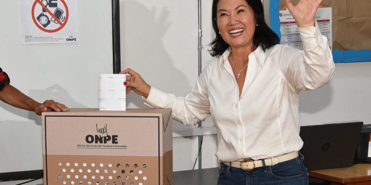 TOPSHOT - Peru's presidential candidate for the Fuerza Popular party, Keiko Fujimori, casts her vote in Lima on April 12, 2026, during the presidential election. Peruvians will elect a new president from a record field of 35 candidates to lead a country plagued by organized crime and chronic political instability. (Photo by AFP)
