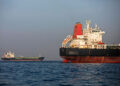 Ships anchored in the Strait of Hormuz near Larak Island, Iran. Photographer: Majid Saeedi/Getty Images Europe