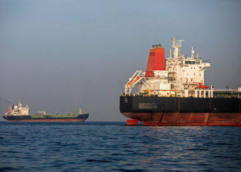 Ships anchored in the Strait of Hormuz near Larak Island, Iran. Photographer: Majid Saeedi/Getty Images Europe