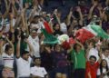 Mexico fans cheer during the first half of a CONCACAF Gold Cup Group A soccer match against Trinidad and Tobago in Arlington, Texas, Saturday, July 10, 2021. (AP Photo/Michael Ainsworth)